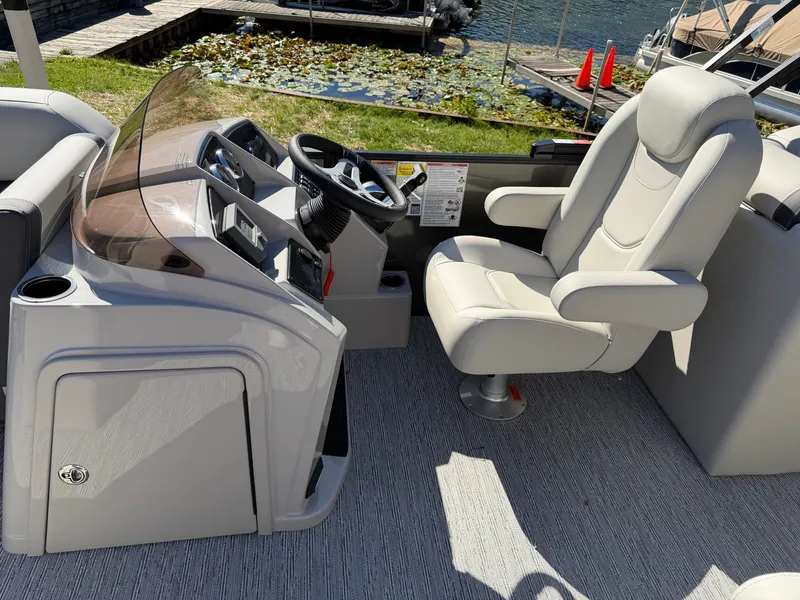Slide: The Image of The image shows the cockpit of a 2027 Sylvan Mirage 822 LZ with a comfortable captain's chair. - 14