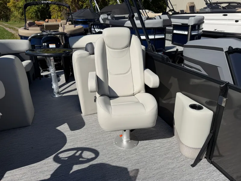 Slide: The Image of A modern boat seat with armrests on a 2027 Sylvan Mirage 822 LZ. - 12