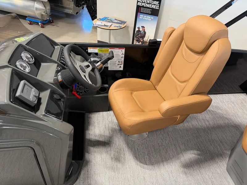 Slide: The Image of The 2027 Sylvan MIRAGE 822 CLZ DH features a sleek, upholstered captain's chair and modern dashboard. - 19