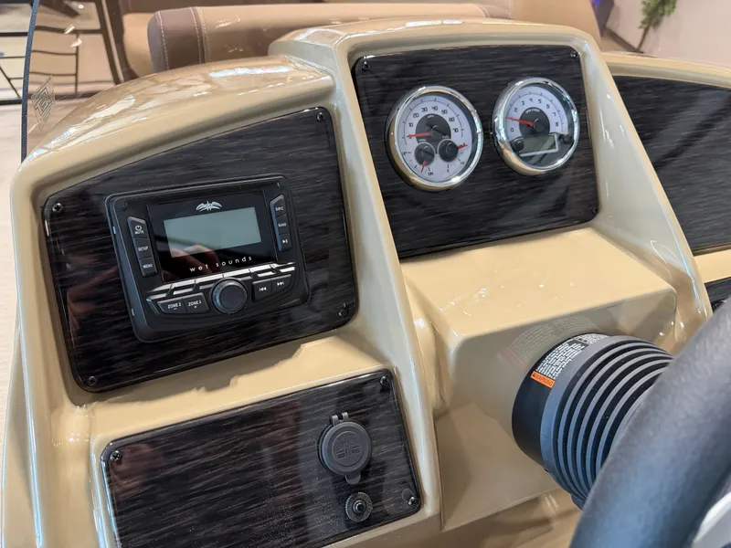 Slide: The Image of Dashboard of a Sylvan Mirage 822 LZ with radio and gauges. - 22