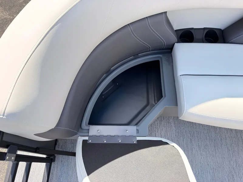 Slide: The Image of The 2027 Sylvan Mirage 822 LZ features a sleek seating area with integrated storage. - 14
