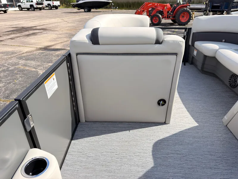 Slide: The Image of The image shows the interior of a 2027 Sylvan Mirage 822 LZ with gray upholstery. - 31