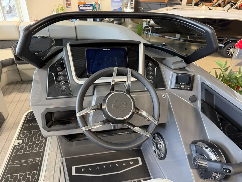 Slide: The Image of The image shows the helm of a 2027 Sylvan G-3 ULZ with modern design and touchscreen. - 21