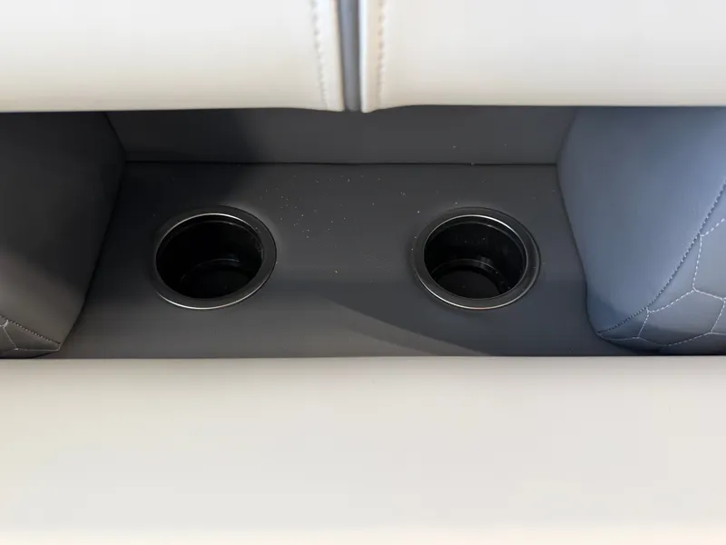 Slide: The Image of Close-up of two cup holders in a modern boat seat. - 10