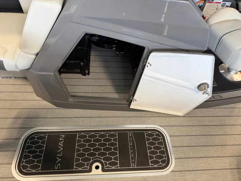 Slide: The Image of The image shows the interior of a 2027 Sylvan G-3 ULZ with an open storage compartment door. - 17