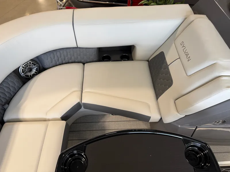 Slide: The Image of The 2027 Sylvan G-3 ULZ features a luxurious, cushioned seating area with an integrated speaker. - 11