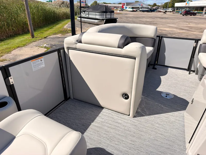 Slide: The Image of The image shows the interior of a 2027 Sylvan Mirage 820 CLZ DH with beige upholstery. - 28