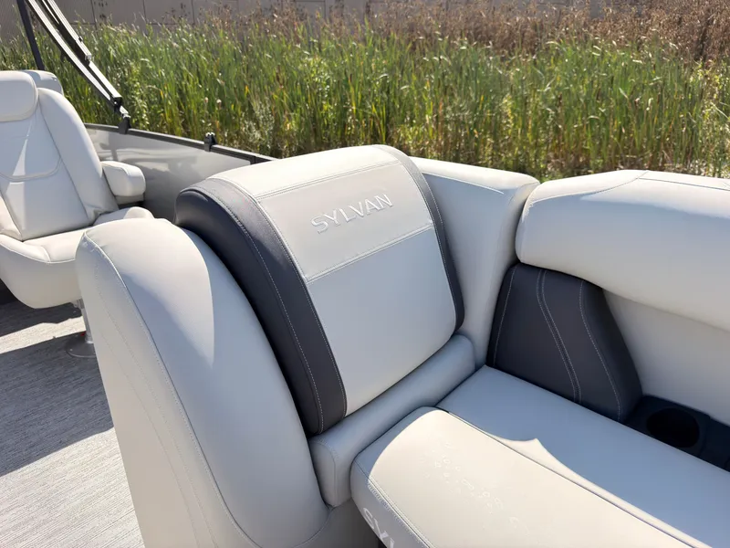 Slide: The Image of The Sylvan Mirage 820 CLZ DH features luxurious cream upholstery with gray accents. - 23