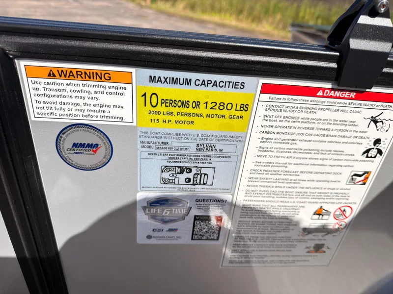 Slide: The Image of Warning labels and capacity information on a boat, including maximum persons and weight limits. - 39