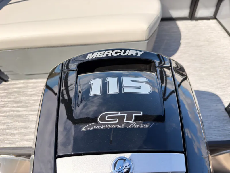 Slide: The Image of A Mercury 115 horsepower outboard motor on a Sylvan Mirage 820 CLZ DH boat. - 49