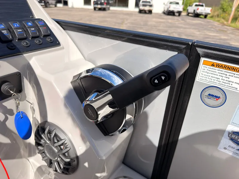 Slide: The Image of Close-up of the throttle lever on a Sylvan Mirage 820 CLZ DH boat. - 38