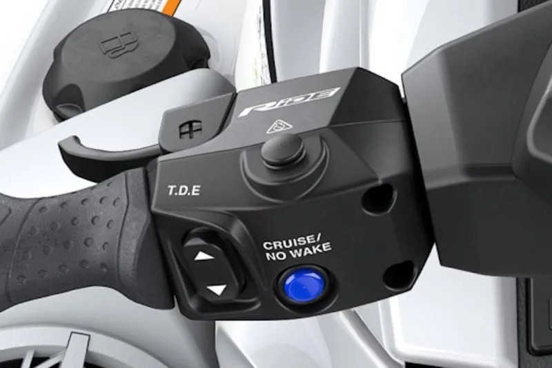 Slide: The Image of Close-up of 2026 Yamaha WaveRunner VX Deluxe handlebar controls, featuring cruise and no wake buttons. - 19