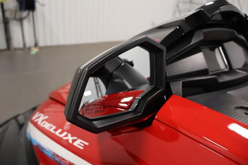 Slide: The Image of 2026 Yamaha WaveRunner VX Deluxe, red exterior, side mirror detail in focus. - 24