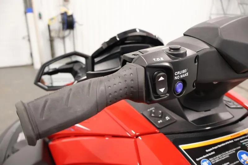 Slide: The Image of 2026 Yamaha WaveRunner VX Deluxe handlebar with cruise control button, close-up view. - 13