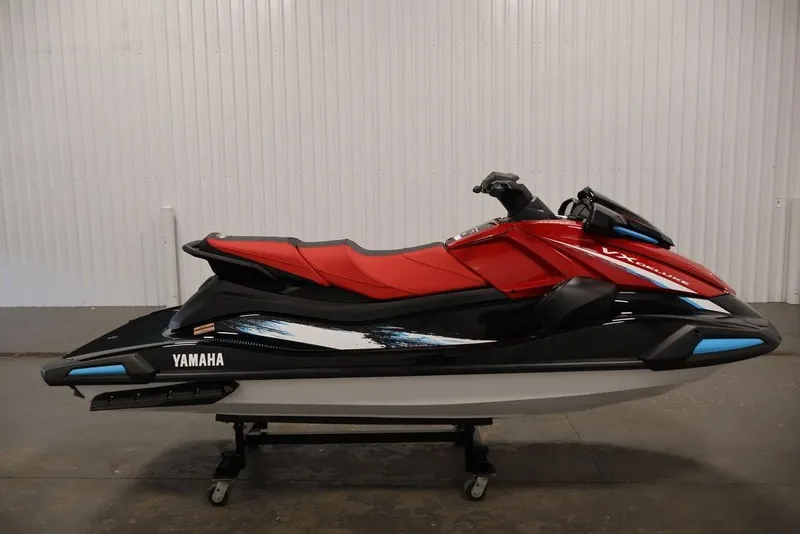 Slide: The Image of 2026 Yamaha WaveRunner VX Deluxe in red and black, displayed indoors on a stand. - 5