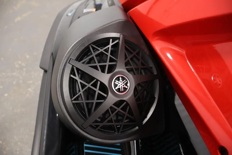 Slide: The Image of 2026 Yamaha WaveRunner VX Deluxe speaker detail with sleek red and black design. - 8