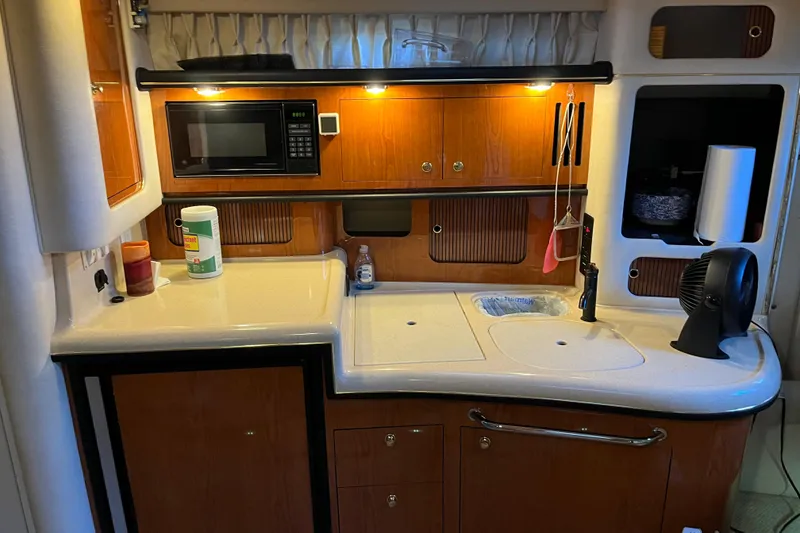 Slide: The Image of Interior galley of 2001 Sea Ray 340 Sundancer with microwave and sink. - 18