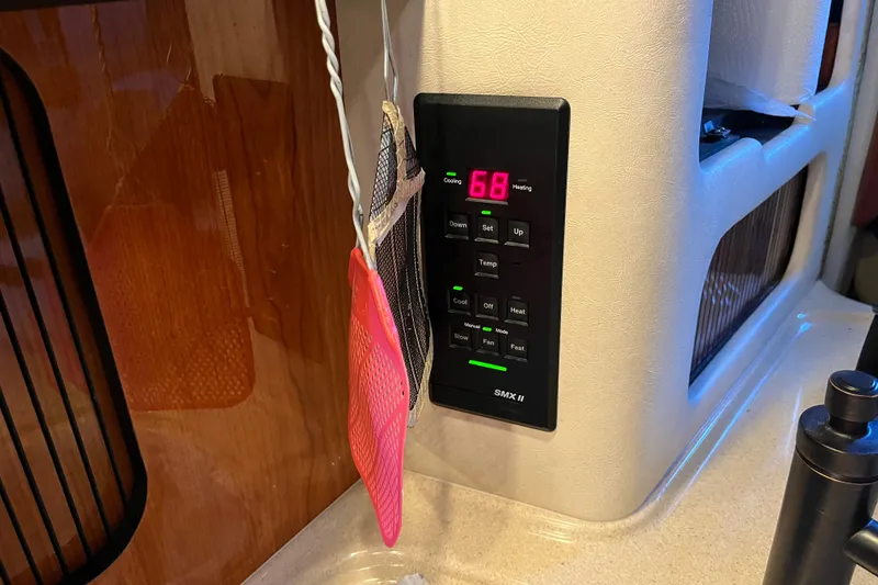 Slide: The Image of Digital control panel on 2001 Sea Ray 340 Sundancer boat interior. - 20