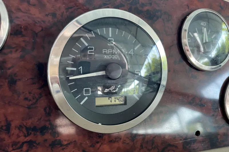 Slide: The Image of Tachometer of 2001 Sea Ray 340 Sundancer showing RPM and engine hours. - 35