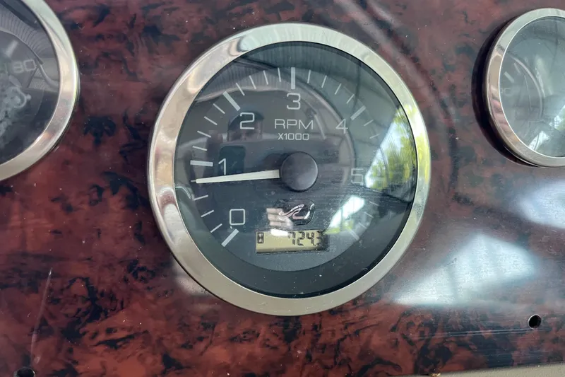 Slide: The Image of Tachometer of 2001 Sea Ray 340 Sundancer showing RPM and engine hours. - 34