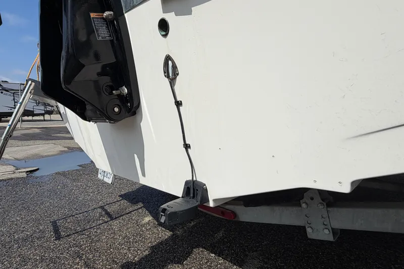 Slide: The Image of Rear view of a 2005 Wellcraft 200 LT Fisherman boat on a trailer. - 11