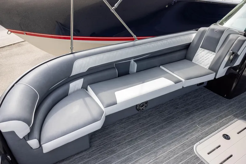 Slide: The Image of Luxurious seating on 2026 Premier 270 Intrigue GTS RF boat, featuring sleek gray upholstery. - 5