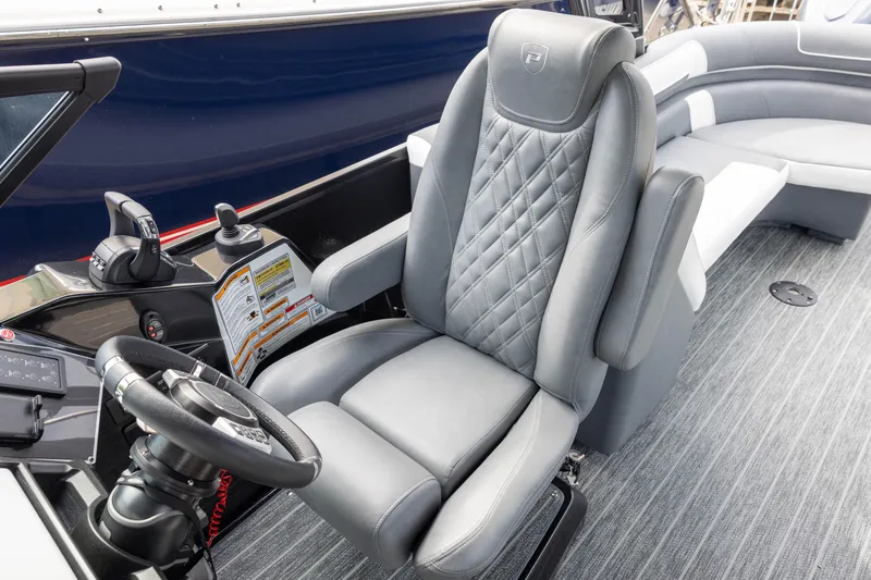 Slide: The Image of Luxurious helm seat in 2026 Premier 270 Intrigue GTS RF boat interior. - 11