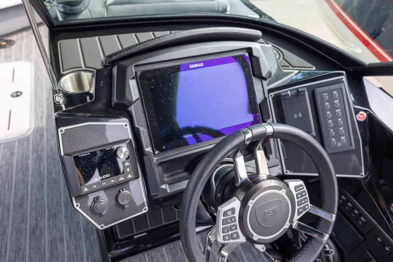 Slide: The Image of Cockpit of 2026 Premier 270 Intrigue GTS RF - CL with Port Gate, featuring advanced controls. - 12