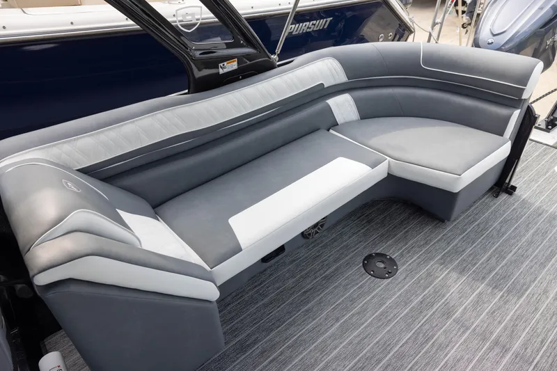 Slide: The Image of Luxurious seating on 2026 Premier 270 Intrigue GTS RF boat, featuring sleek gray upholstery. - 13