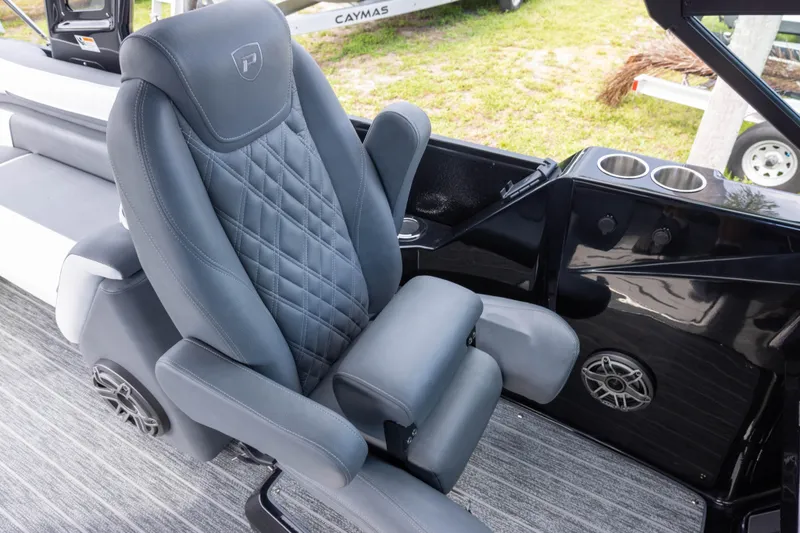 Slide: The Image of Luxurious seating in 2026 Premier 270 Intrigue GTS RF boat, featuring quilted upholstery and cup holders. - 8