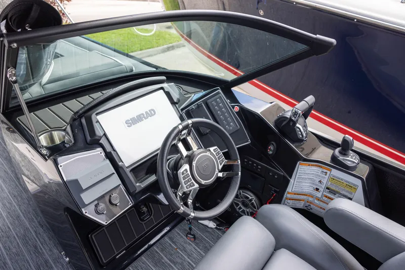 Slide: The Image of Interior view of 2026 Premier 270 Intrigue GTS RF boat dashboard with advanced controls. - 10