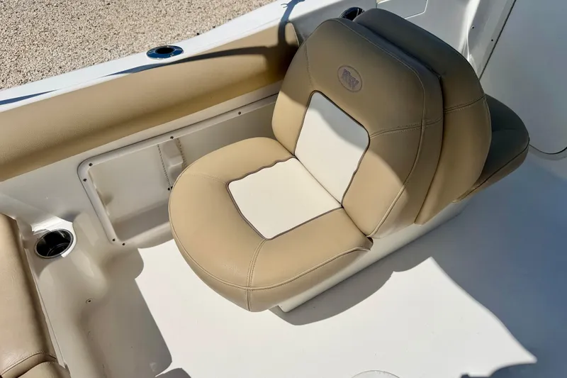 Slide: The Image of Beige and white cushioned seat on 2016 Key West 203 DFS boat. - 23