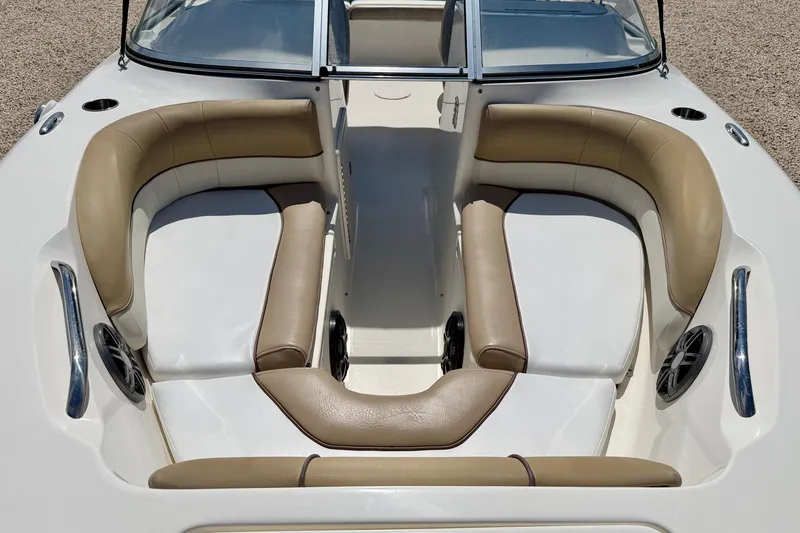 Slide: The Image of Interior view of 2016 Key West 203 DFS boat with tan and white seating. - 9