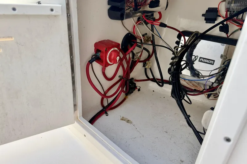 Slide: The Image of Electrical wiring inside a 2016 Key West 203 DFS boat compartment. - 30