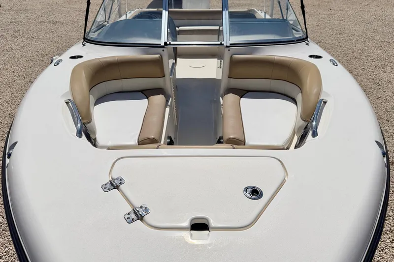 Slide: The Image of 2016 Key West 203 DFS boat with beige seating and windshield, viewed from above. - 8