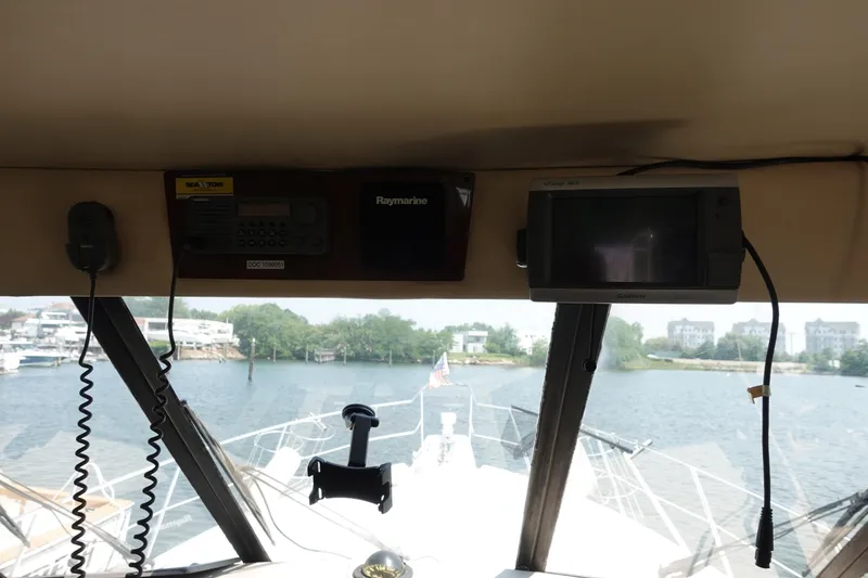 Slide: The Image of Interior view of 2000 Bayliner 4788 Pilot House Motoryacht with navigation equipment. - 18