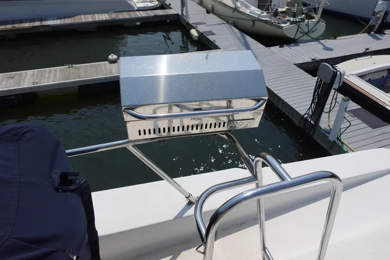 Slide: The Image of Stainless steel grill on 2000 Bayliner 4788 Pilot House Motoryacht, docked at marina. - 14