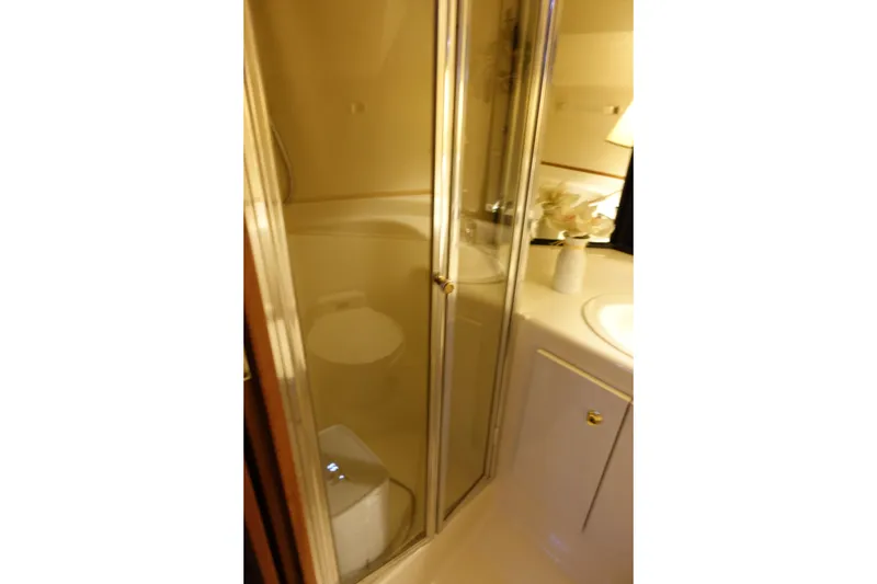 Slide: The Image of Bathroom interior of 2000 Bayliner 4788 Pilot House Motoryacht with shower and sink. - 22