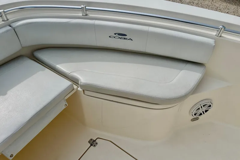 Slide: The Image of 2020 Cobia 237 Center Console boat interior seating with speaker detail. - 10