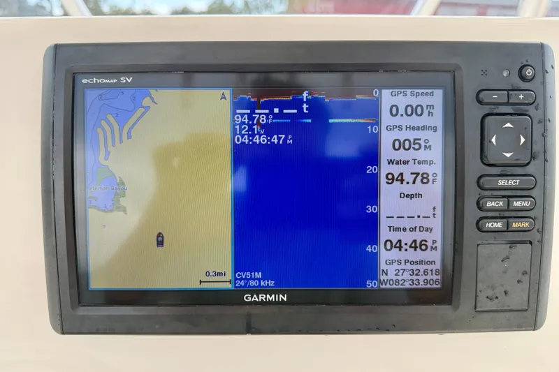 Slide: The Image of Garmin echomap SV displaying navigation data on a 2020 Cobia 237 Center Console boat. - 21