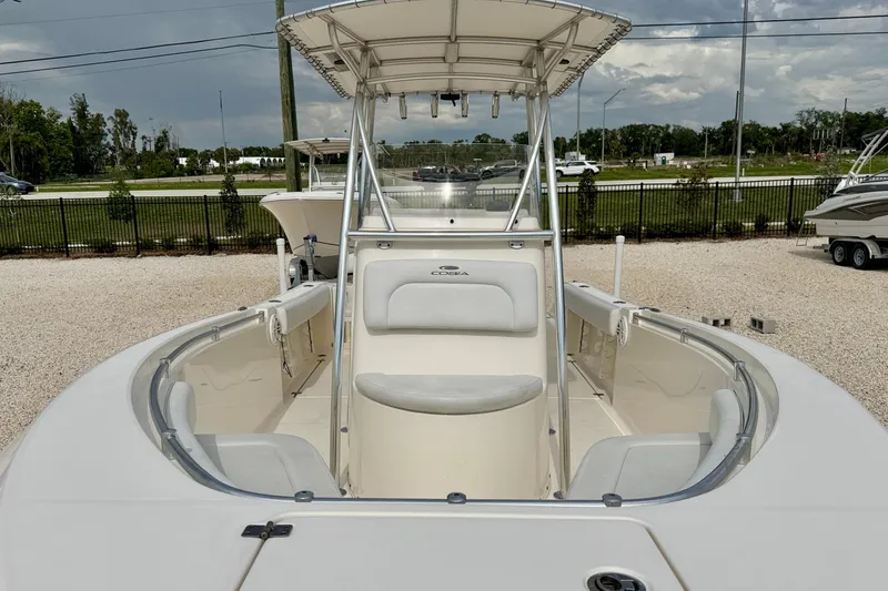 Slide: The Image of 2020 Cobia 237 Center Console boat with spacious seating and sleek design. - 12