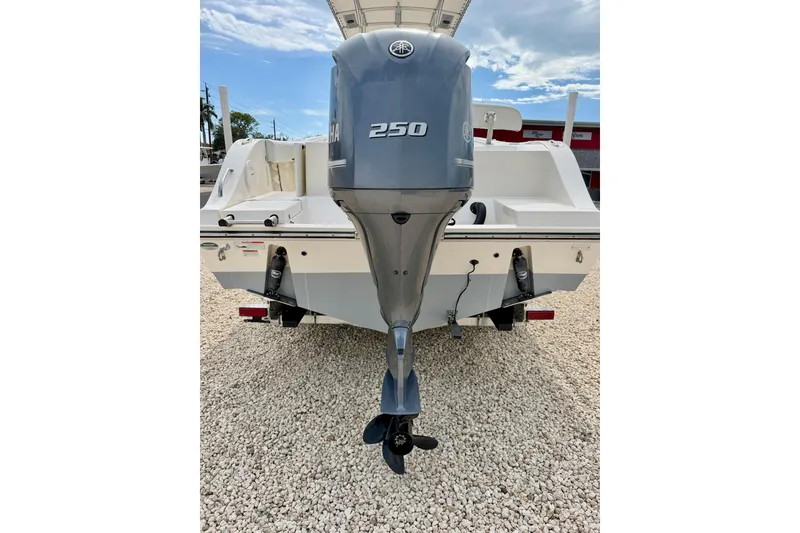 Slide: The Image of 2020 Cobia 237 Center Console boat with Yamaha 250 outboard motor, rear view. - 35