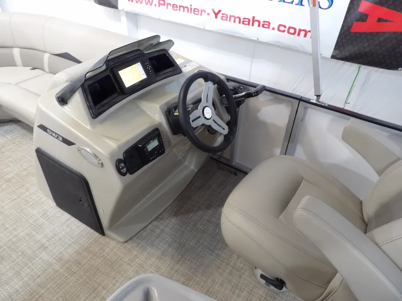 Slide: The Image of The image shows the cockpit of a 2022 SilverWave 2410 RLP SW3 with beige seating and a modern helm. - 13