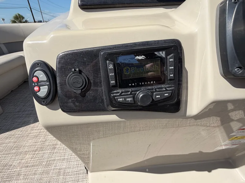 Slide: The Image of The image shows the dashboard of a 2022 SilverWave 2410 RLP SW3 with a Bluetooth-enabled sound system. - 40