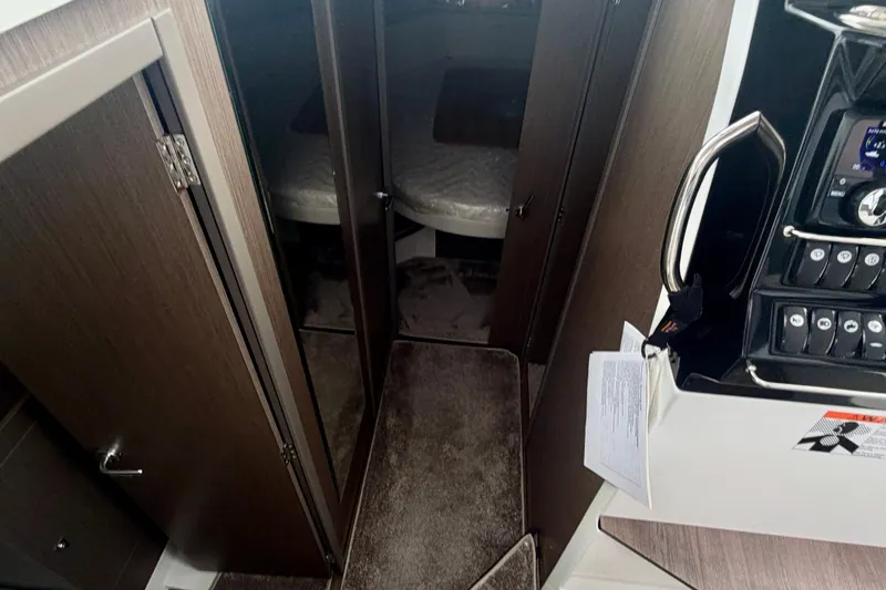 Slide: The Image of Interior view of 2026 Jeanneau NC 1095 Coupe, featuring cabin entrance and control panel. - 104