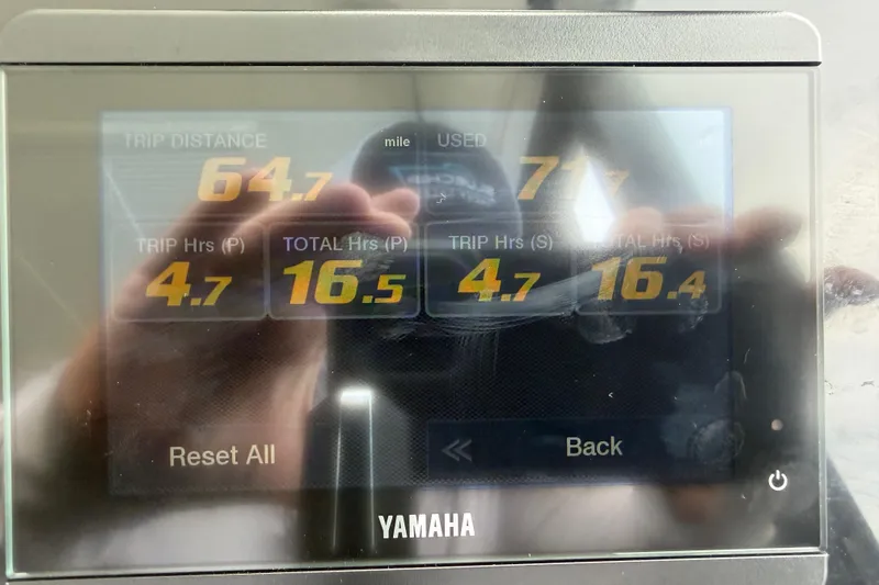 Slide: The Image of Display screen showing trip data on a 2026 Jeanneau NC 1095 Coupe boat. - 75