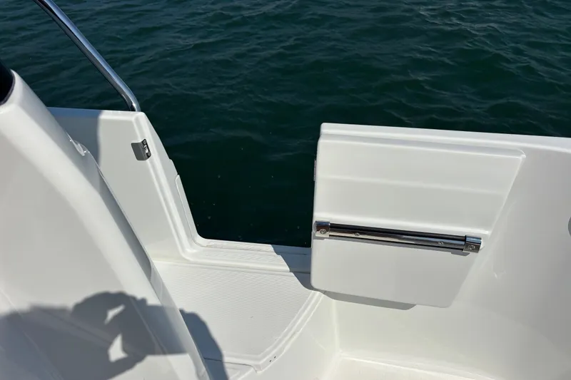 Slide: The Image of 2026 Jeanneau NC 1095 Coupe Series 2 boat deck with open side door. - 35