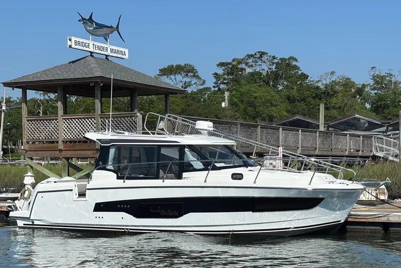 The Image of 2026 Jeanneau NC 1095 Coupe Series 2 docked at Bridge Tender Marina. - 0