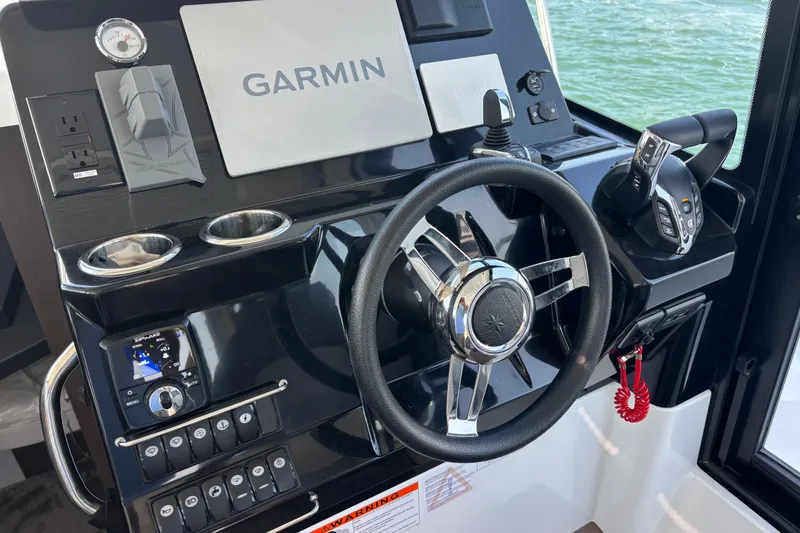 Slide: The Image of Helm of 2026 Jeanneau NC 1095 Coupe Series 2 with Garmin navigation system. - 34