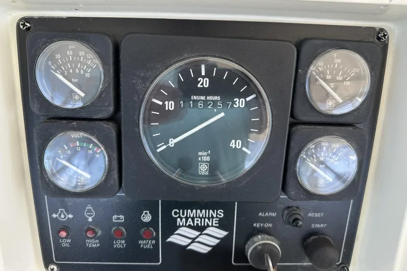 Slide: The Image of The image shows a Cummins Marine dashboard with various gauges and indicator lights. - 20